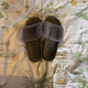 Grey furry slip on shoes